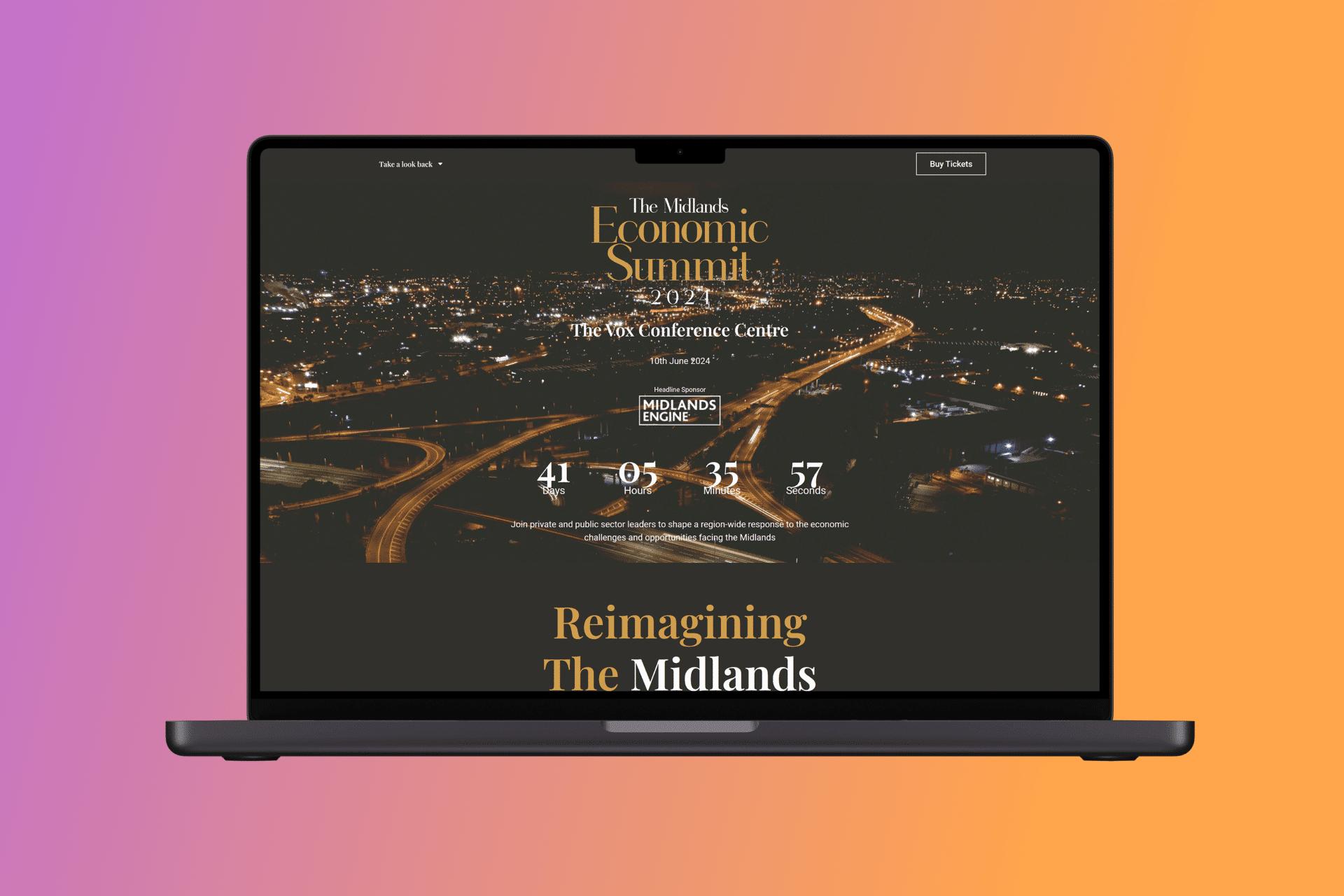 Macbook render with Midlands Economic Summit screenshot inside it.